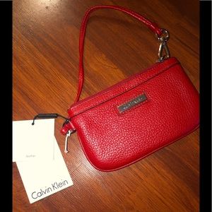 Calvin Klein wrist purse new leather
